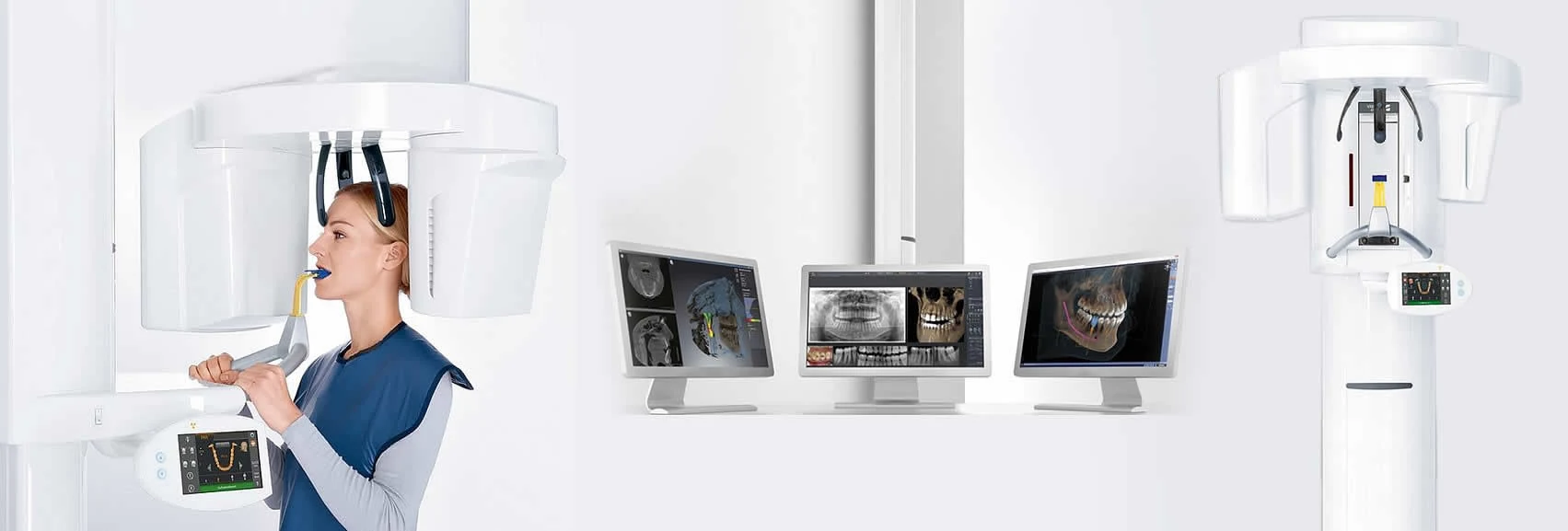 A patient being scanned in the cone beam CBCT unit, with 3D scans on the monitors